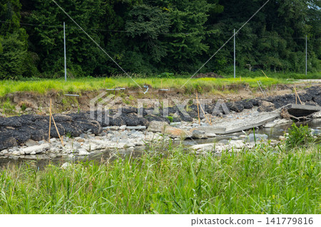 Restoration work following heavy rain disaster at Beppu River in Gamou-cho, Aira City, Kagoshima Prefecture Restoration work following heavy rain disaster at Beppu River in Gamou-cho, Aira City, Kagoshima Prefecture 141779816