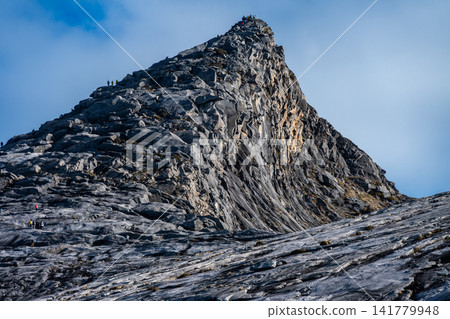 Scenery view of the Low's peak (4,095 m) the highest spot on Mt.Kinabalu, Malaysia. Mount Kinabalu deserves to be acknowledged as the highest mountain in Southeast Asia. Scenery view of the Low's peak (4,095 m) the highest spot on Mt.Kinabalu, Malaysia. Mount Kinabalu deserves to be acknowledged as the highest mountain in Southeast Asia. 141779948