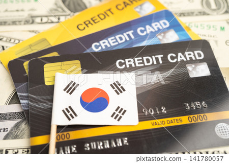 Credit card model with South Korea flag, financial investment economy business banking. Credit card model with South Korea flag, financial investment economy business banking. 141780057