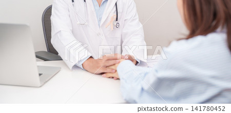 doctor holding patient hand to comfort and support with empathy. peach ribbon concept of September Uterine Cancer Awareness month, Endometrial, Gynecologic, Uterus and Ovaries, Endometriosis 141780452
