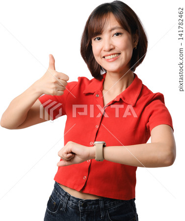 Asian woman giving thumbs up while checking wristwatch in red shirt isolated on transparent background Asian woman giving thumbs up while checking wristwatch in red shirt isolated on transparent background 141782462
