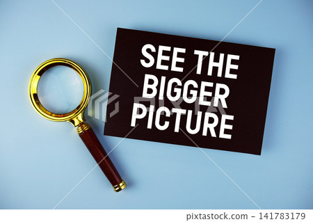 See the Bigger Picture text with Magnifying glass on blue background See the Bigger Picture text with Magnifying glass on blue background 141783179