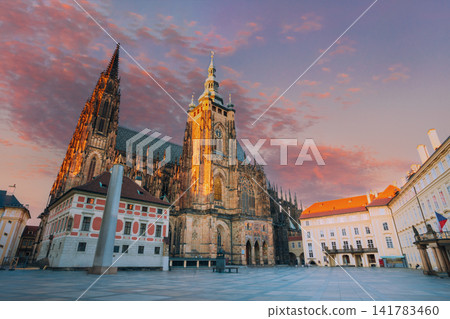 St Vitus Cathedral towers above square at sunset in Prague St Vitus Cathedral towers above square at sunset in Prague 141783460