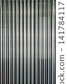 densely packed metal poles 141784117