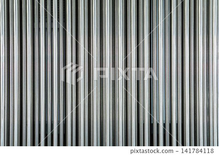 densely packed metal poles densely packed metal poles 141784118