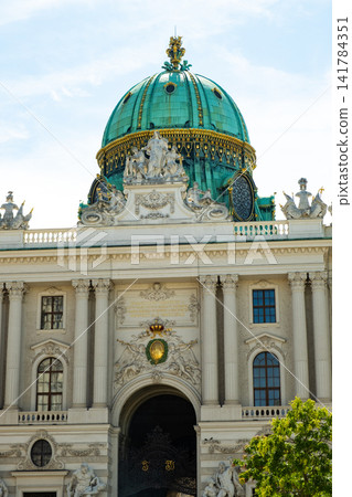 Green dome and facade of Hofburg Palace Michaelertrakt. Green dome and facade of Hofburg Palace Michaelertrakt. 141784351
