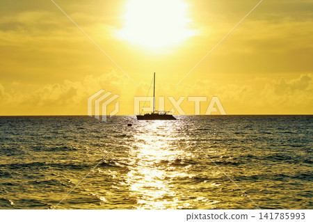Okinawa, Miyako Island: The sea and yachts at sunset. Okinawa, Miyako Island: The sea and yachts at sunset. 141785993
