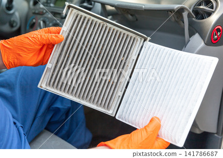 Clean and dirty cabin pollen air filter for a car Clean and dirty cabin pollen air filter for a car 141786687