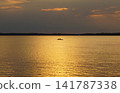 Golden sunset over the lake Sniardwy in Nowe Guty, Masuria, Poland 141787338