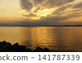 Golden sunset over the lake Sniardwy in Nowe Guty, Masuria, Poland 141787339