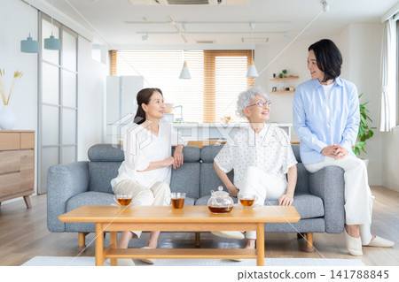 A senior female friend relaxing at home A senior female friend relaxing at home 141788845