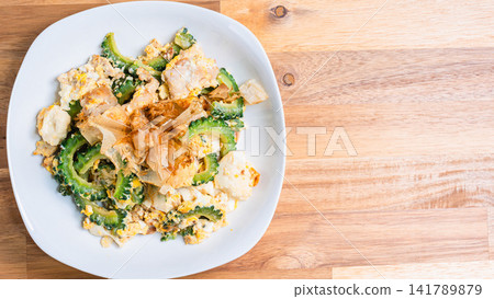 Goya Champuru: An Okinawan home-style dish made with tofu and eggs. Goya Champuru: An Okinawan home-style dish made with tofu and eggs. 141789879