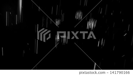 High speed close up of falling rain droplets isolated on a black background creating a realistic weather VFX overlay perfect for cinematic compositing visual effects motion graphics and atmospheric High speed close up of falling rain droplets isolated on a black background creating a realistic weather VFX overlay perfect for cinematic compositing visual effects motion graphics and atmospheric 141790166