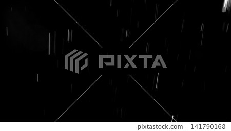 High speed close up of falling rain droplets isolated on a black background creating a realistic weather VFX overlay perfect for cinematic compositing visual effects motion graphics and atmospheric High speed close up of falling rain droplets isolated on a black background creating a realistic weather VFX overlay perfect for cinematic compositing visual effects motion graphics and atmospheric 141790168
