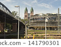 The Herz Jesus Church is characterized by its bright green roof and twin towers (two spires), which are easily visible from afar. 141790301