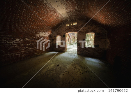 The brick fortress ruins and sunlight filtering through the trees at the site of the Third Battery on Tomogashima Island The brick fortress ruins and sunlight filtering through the trees at the site of the Third Battery on Tomogashima Island 141790652