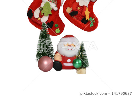 Decorative composition with a figurine of Santa Claus. Decorative composition with a figurine of Santa Claus. 141790687