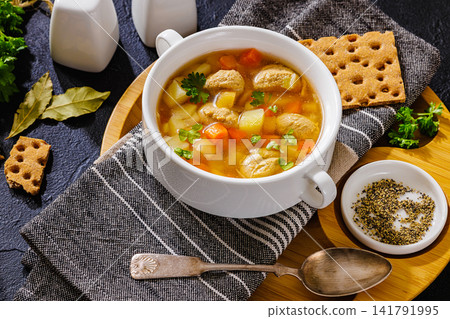 turkey meatball soup with carrots and potato turkey meatball soup with carrots and potato 141791995