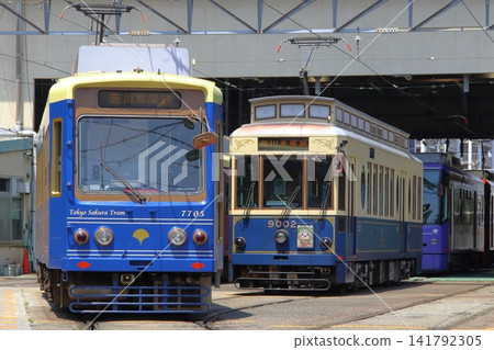 A blue Toden Arakawa Line streetcar parked at the Arakawa depot (Arakawa Ward, Tokyo) A blue Toden Arakawa Line streetcar parked at the Arakawa depot (Arakawa Ward, Tokyo) 141792305