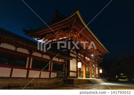 The Todai-ji Temple's main gate and corridor, shining brightly at night. The Todai-ji Temple's main gate and corridor, shining brightly at night. 141793032