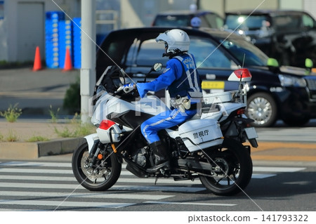 Image of a police motorcycle on patrol Image of a police motorcycle on patrol 141793322