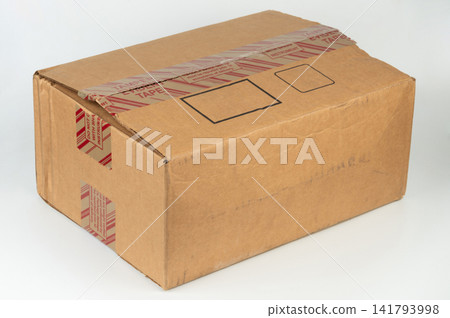 Cardboard box with tape for transportation Cardboard box with tape for transportation 141793998