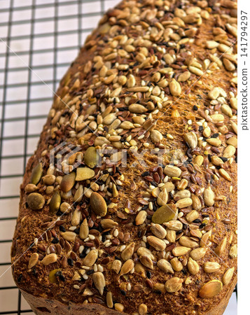 Close View Of Seeded Keto Bread On Cooling Rack Close View Of Seeded Keto Bread On Cooling Rack 141794297