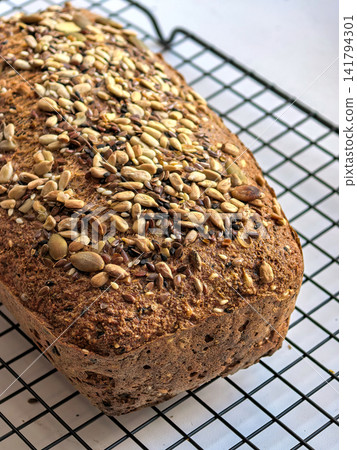 Fresh Keto Bread Loaf With Mixed Seed Topping 141794301