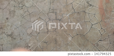 Cracked Concrete Wall Texture Background Cracked Concrete Wall Texture Background 141794325