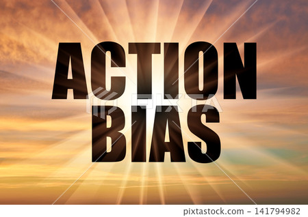 Action Bias Conceptual Phrase On Golden Sunset Sky With Sun Beams Action Bias Conceptual Phrase On Golden Sunset Sky With Sun Beams 141794982