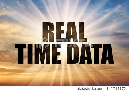 Real time data concept glowing on dramatic sunset sky Real time data concept glowing on dramatic sunset sky 141795172
