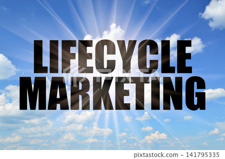 Lifecycle marketing words against a clear blue daytime sky with bright sun rays 141795335