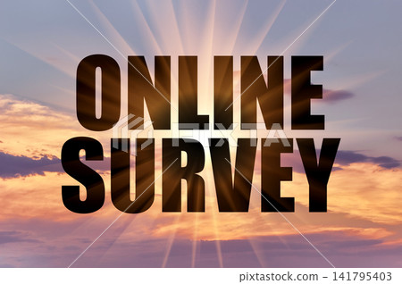 Online survey conceptual words on a dramatic colorful evening sky with bright rays Online survey conceptual words on a dramatic colorful evening sky with bright rays 141795403
