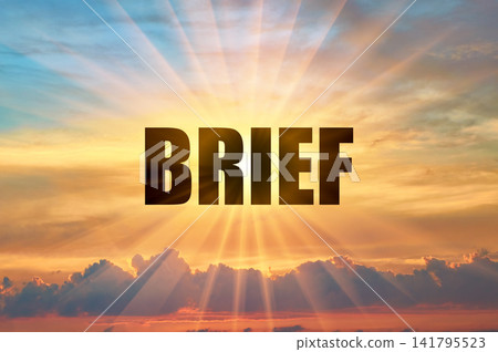Brief conceptual word on a bright golden evening sky with sun rays Brief conceptual word on a bright golden evening sky with sun rays 141795523
