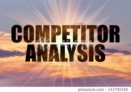 Competitor analysis phrase on a bright golden evening sunset sky with sun Competitor analysis phrase on a bright golden evening sunset sky with sun 141795589