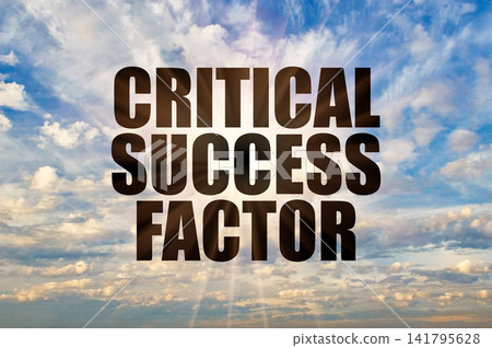 Critical success factor text against sun rays and clouds Critical success factor text against sun rays and clouds 141795628