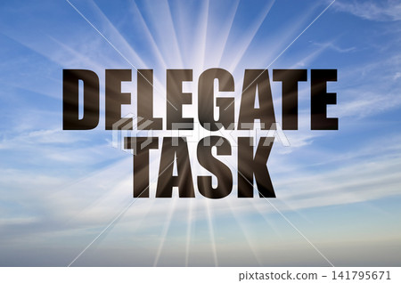 Delegate task text against bright sun rays in clear blue sky Delegate task text against bright sun rays in clear blue sky 141795671