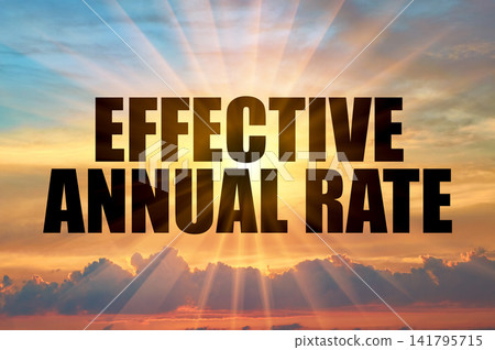 Effective annual rate text against bright sun rays in morning sky Effective annual rate text against bright sun rays in morning sky 141795715