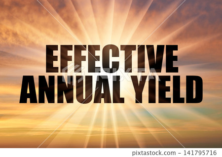 Effective annual yield text against bright sun rays in morning sky 141795716