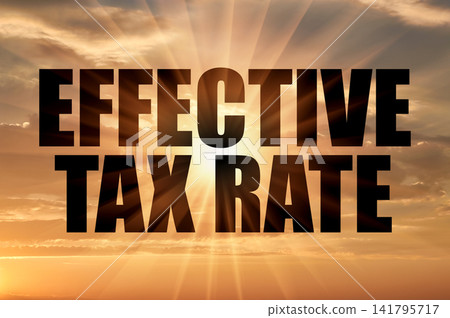 Effective tax rate text against golden sun rays in evening sky Effective tax rate text against golden sun rays in evening sky 141795717