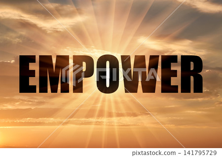 Empower Concept Written on Golden Evening Sky with Glowing Rays Empower Concept Written on Golden Evening Sky with Glowing Rays 141795729