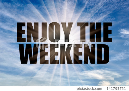 Enjoy The Weekend Concept on Bright Blue Day Sky with Sun Rays Enjoy The Weekend Concept on Bright Blue Day Sky with Sun Rays 141795731