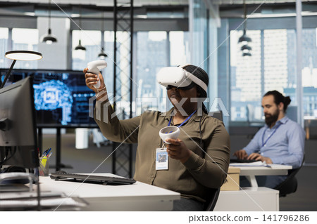 Software developer using virtual reality tech, automating repetitive tasks with AI scripts. IT expert wearing VR gear using artificial intelligence to speed up feature implementation Software developer using virtual reality tech, automating repetitive tasks with AI scripts. IT expert wearing VR gear using artificial intelligence to speed up feature implementation 141796286