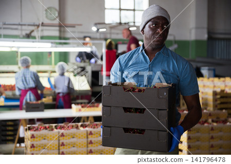 Man is working in storage Man is working in storage 141796478