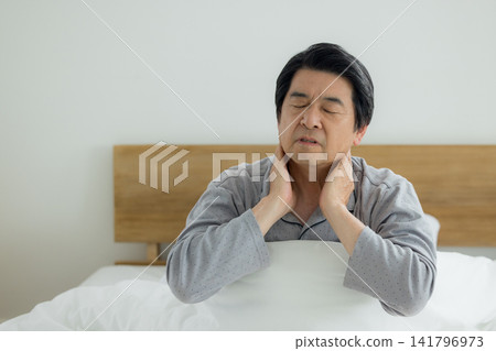 Senior man in the bedroom Senior man in the bedroom 141796973