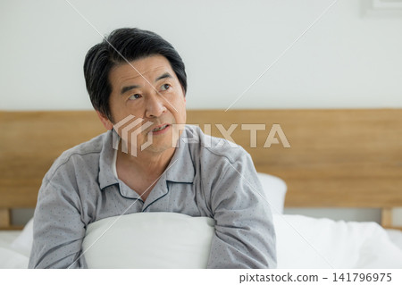 Senior man in the bedroom 141796975