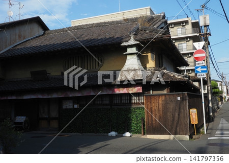 A landscape with old houses A landscape with old houses 141797356