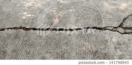 Surface texture of cracked concrete pavement Surface texture of cracked concrete pavement 141798043