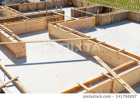 Construction of the foundation of a house, slab foundation, concrete, and concrete floor Construction of the foundation of a house, slab foundation, concrete, and concrete floor 141798897