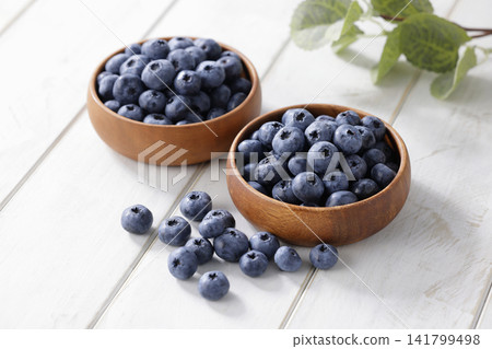 Fresh blueberries arranged on a plate Fresh blueberries arranged on a plate 141799498